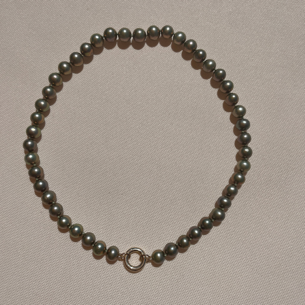 olive pearls with charm enhancer 