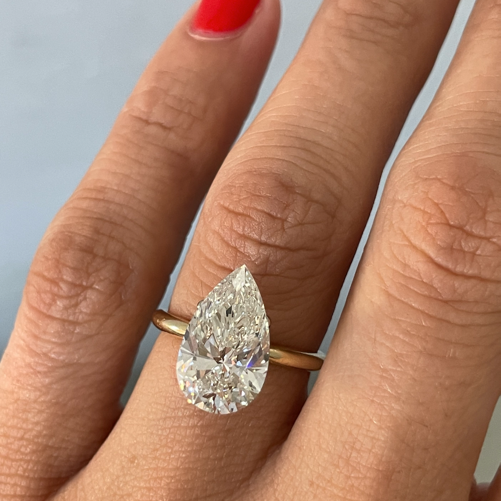 large pear diamond on hand